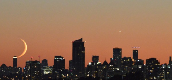 Moon kissing the skyline