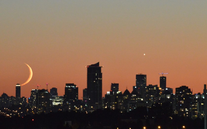 Moon kissing the skyline